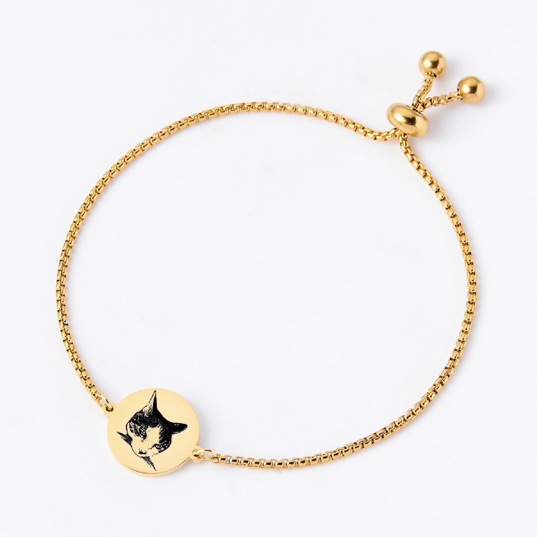 Gold custom pet face bracelet with round pendant.