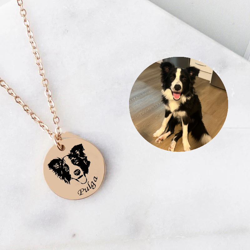 Personalized rose gold pet face necklace with detailed engraving.