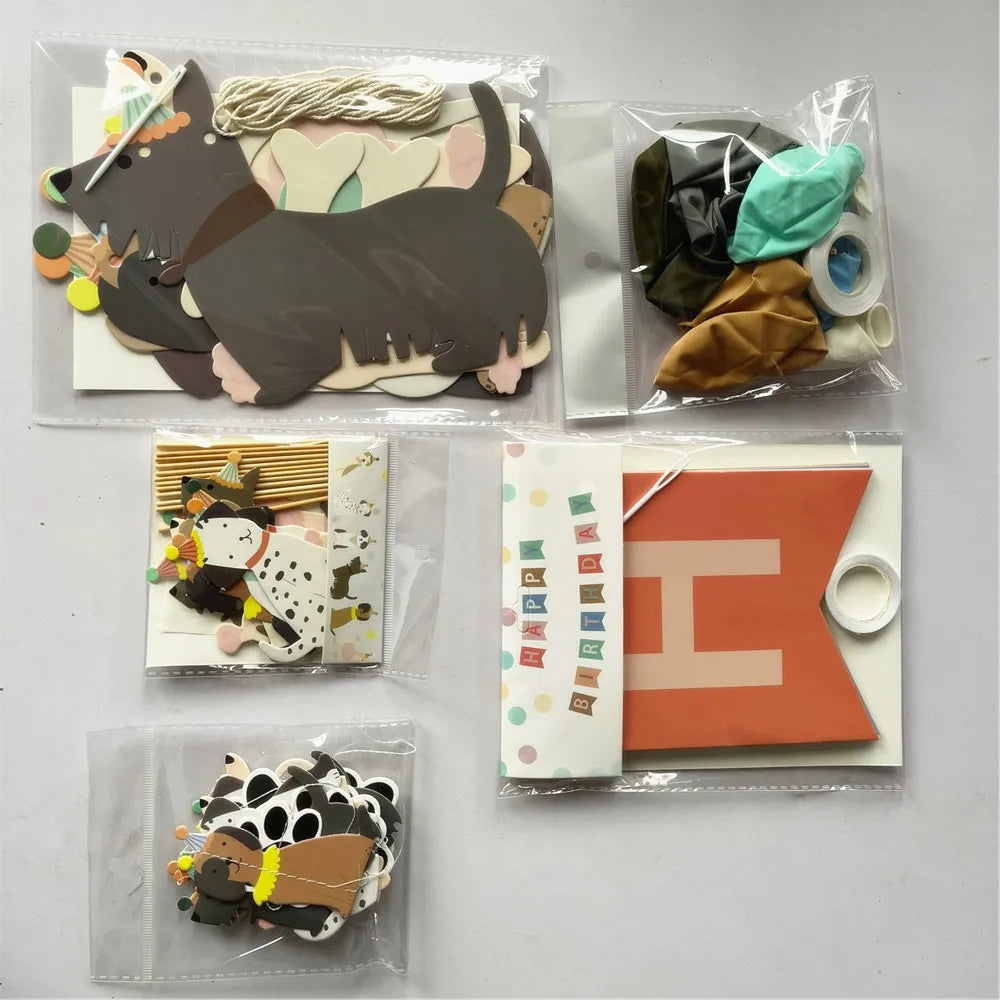 Dog birthday party decoration supplies flat lay