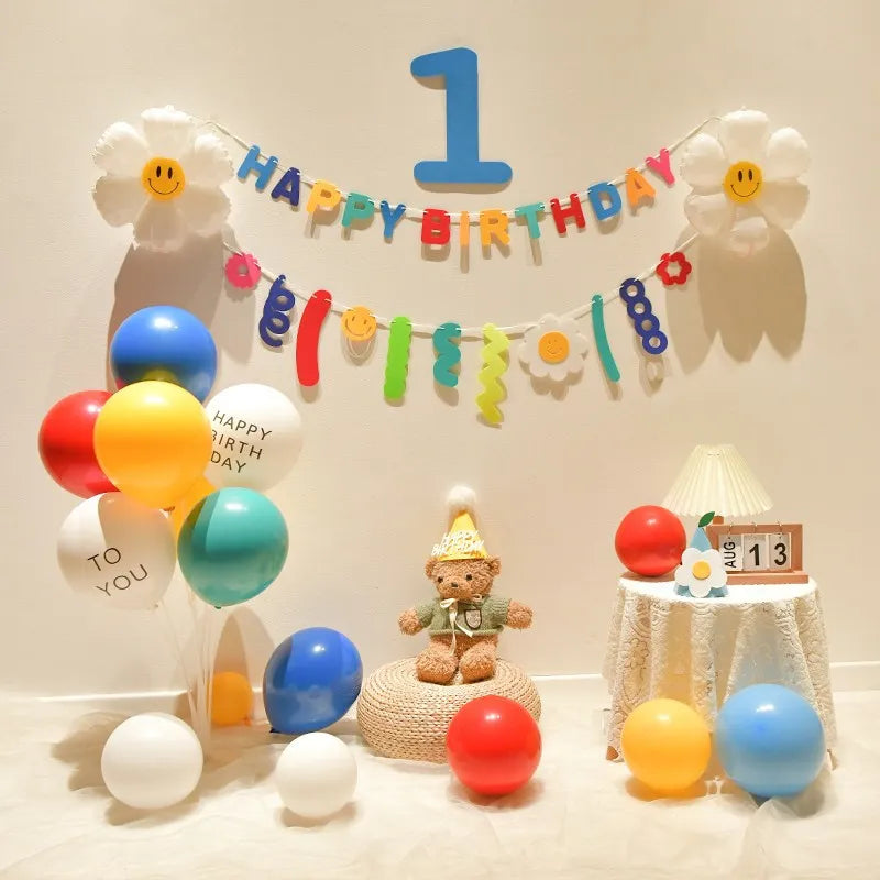 Rainbow ruffled balloon column birthday backdrop set with number 1