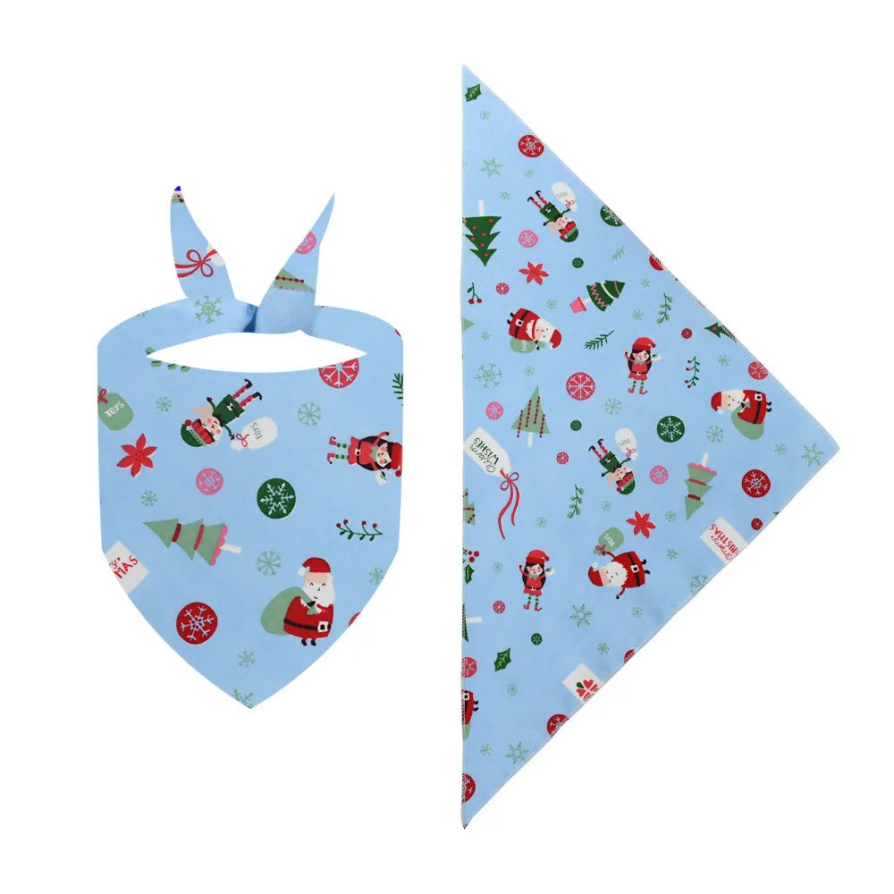 Light blue Christmas pet bandana with holiday graphics