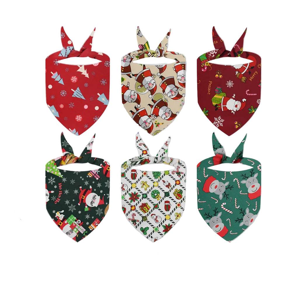 Multiple Christmas pet bandanas displayed flat, assorted colors