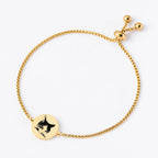 Gold custom pet face bracelet with round pendant.
