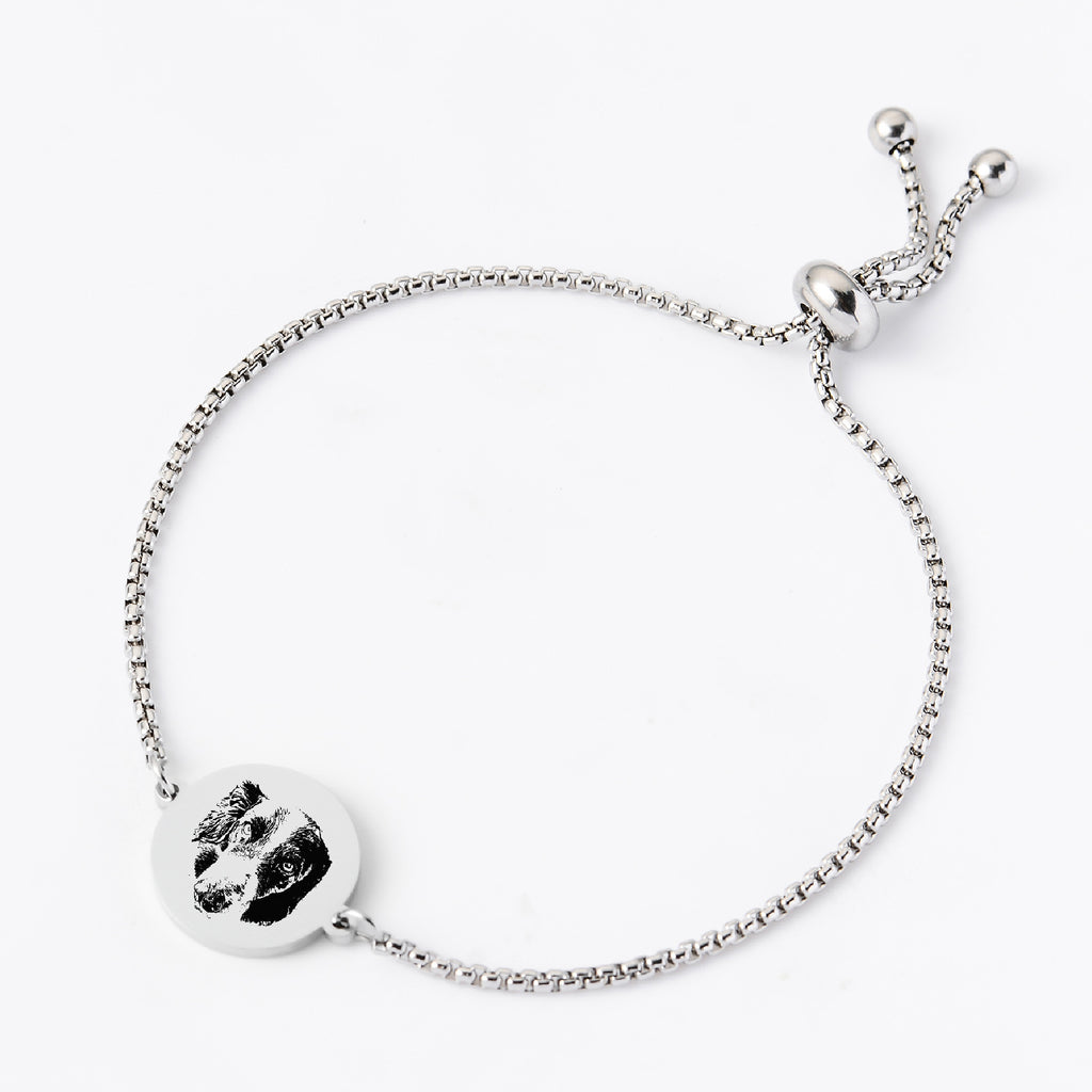 Silver custom pet face bracelet with round pendant.
