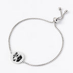 Silver custom pet face bracelet with round pendant.
