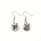 Custom silver pet face earrings with engraved pet portrait design
