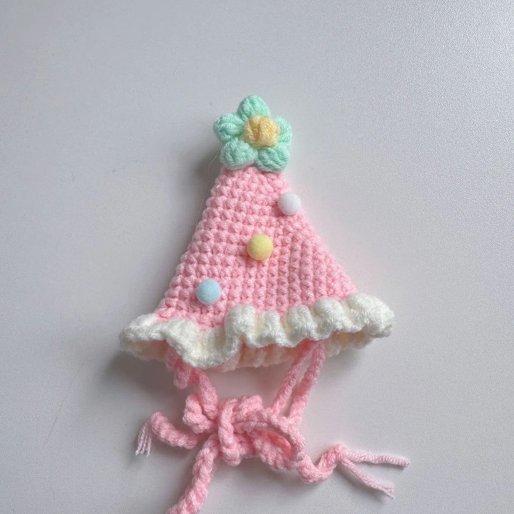 Azure blue pet bib with knitted birthday cake design