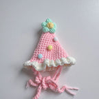 Azure blue pet bib with knitted birthday cake design