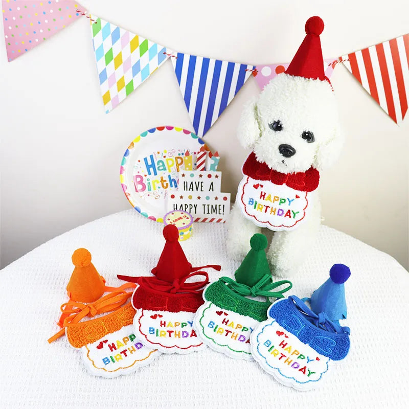 Dogs wearing colorful birthday bib and hat sets