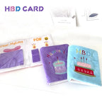 Flat lay of birthday book snuffle toys
