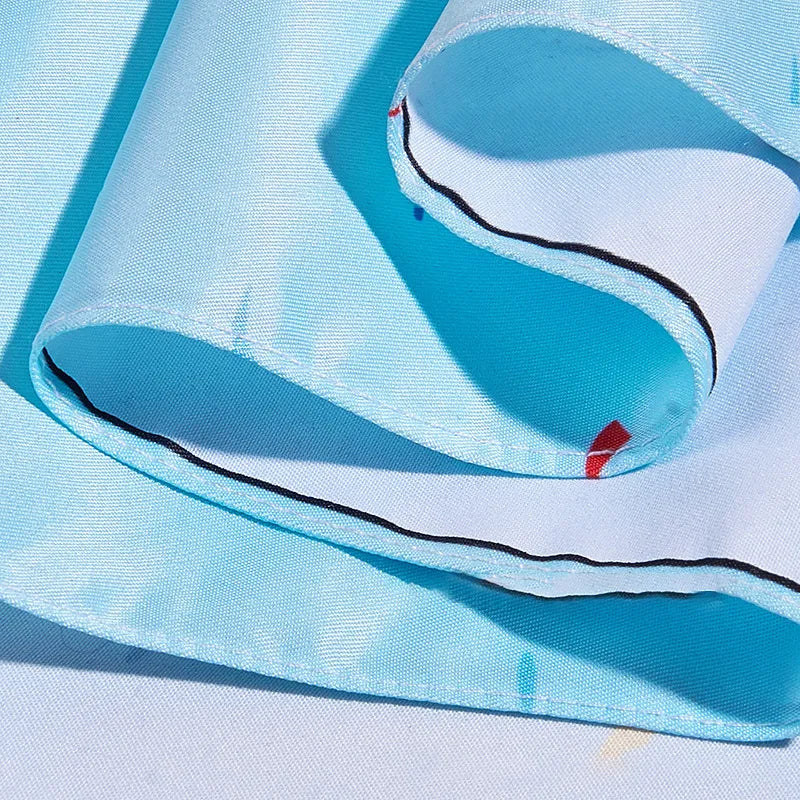 Detail view of blue dog birthday bandana