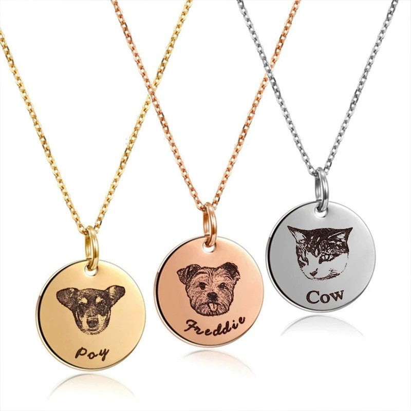 Custom pet face necklaces in gold, rose gold, and silver flat lay display.

