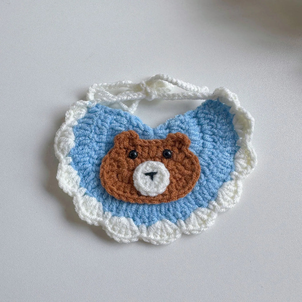 Pink and yellow flower-shaped knitted bib for pets