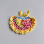 Pink knitted pet birthday hat with pom-pom